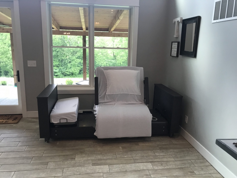 Image of the ActiveCare Deluxe Hospital Bed in a room upright.