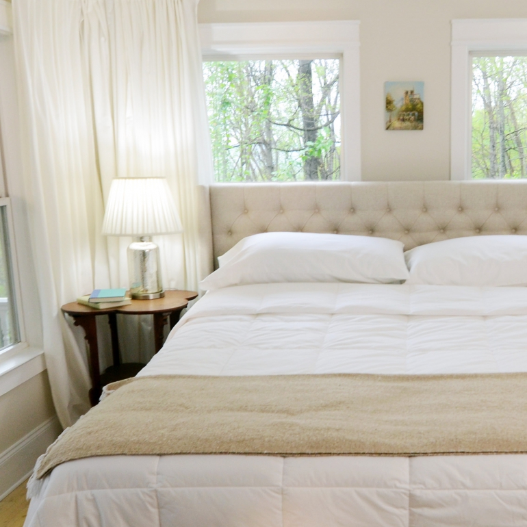 Photo of the adjustable bed base in a bedroom.